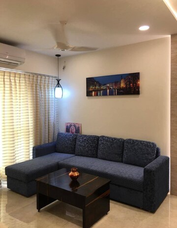 Living Room in 1 BHK Apartment at Lodha Amara, Kolshet Road – for Rent