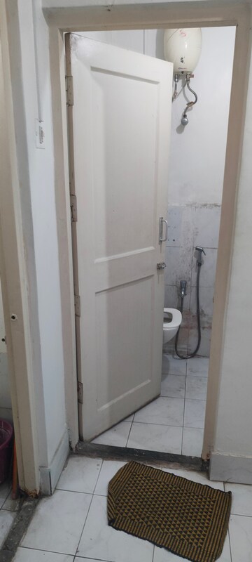 Bathroom in 1 BHK Apartment at Bimbisaar Nagar CHS, Goregaon East – for Rent