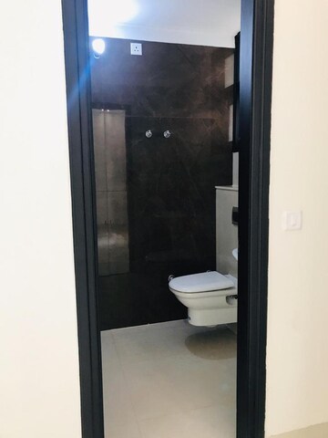 Bathroom in 2 BHK Apartment at Dhakoli Village – for Sale
