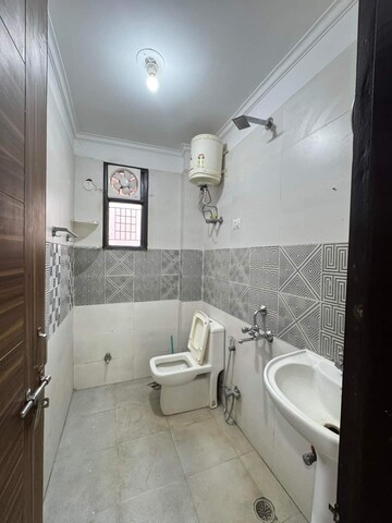 Bathroom in 2 BHK Builder Floor at Chattarpur – for Rent