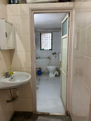 Bathroom in 1 BHK Apartment at River Park Complex, Dahisar East – for Rent
