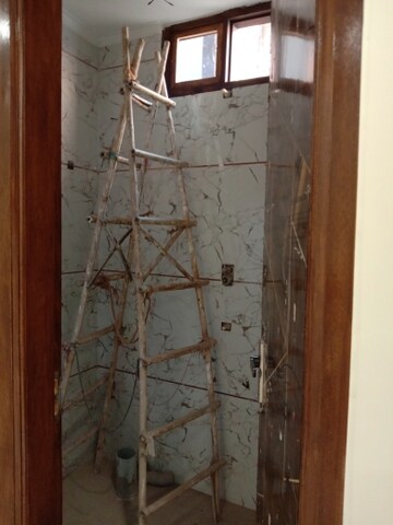 Bathroom in 4 BHK Builder Floor at Dwarka Mor – for Sale