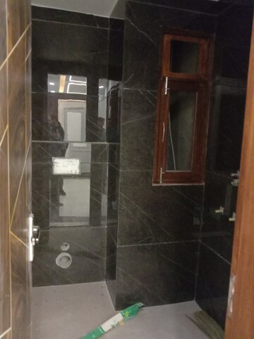 Bathroom in 4 BHK Builder Floor at Dwarka Mor – for Sale