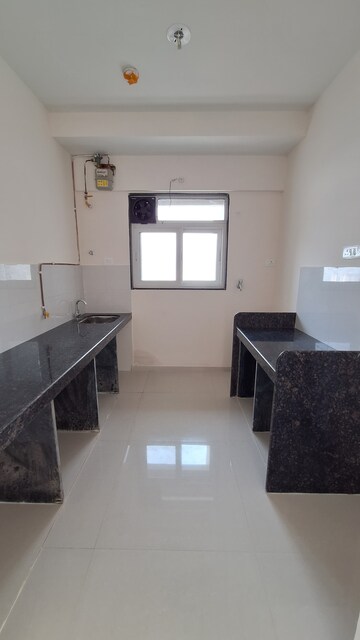 Kitchen in 2 BHK Apartment at Ashar Edge, Pokhran Road No 2 – for Rent