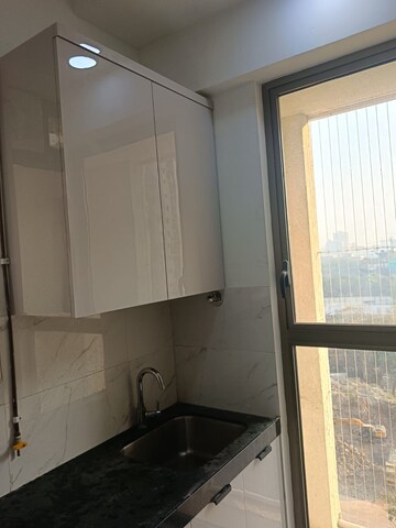 Kitchen in 2 BHK Apartment at Raymond Ten X Era, Pokhran Road No 1 – for Rent