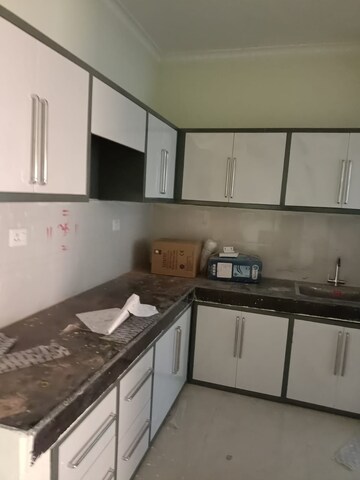 Kitchen in 2 BHK Apartment at JKG Palm Court, Sector 16c Greater Noida – for Rent