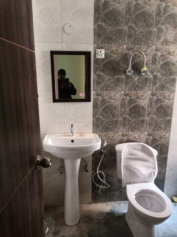 Bathroom in 2 BHK Apartment at JKG Palm Court, Sector 16c Greater Noida – for Rent