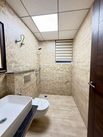 Bathroom in 2 BHK Apartment at Artique Uptown Skylla, International Airport Road – for Rent