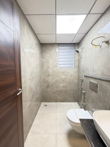 Bathroom in 2 BHK Apartment at Artique Uptown Skylla, International Airport Road – for Rent