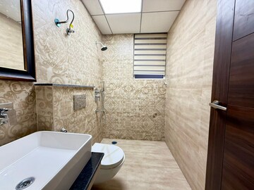 Bathroom in 2 BHK Apartment at Artique Uptown Skylla, International Airport Road – for Rent