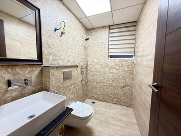 Bathroom in 2 BHK Apartment at Artique Uptown Skylla, International Airport Road – for Rent
