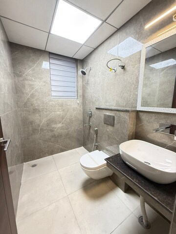 Bathroom in 2 BHK Apartment at Artique Uptown Skylla, International Airport Road – for Rent