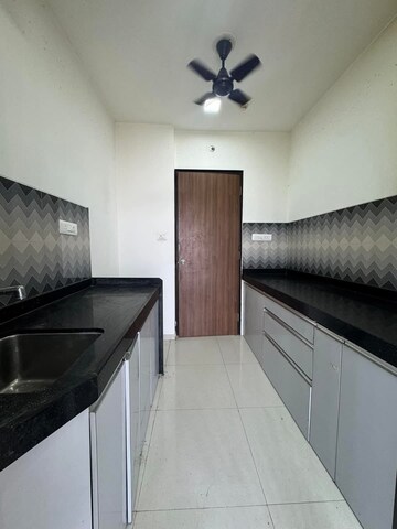 Kitchen in 2 BHK Apartment at Lodha Splendora Phase II, Ghodbunder Road – for Sale