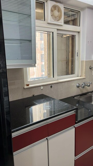 Kitchen in 3 BHK Apartment at Hiranandani Meadows, Manpada – for Rent