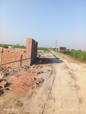 Plot Area in  Plot at Bhopani Village – for Sale