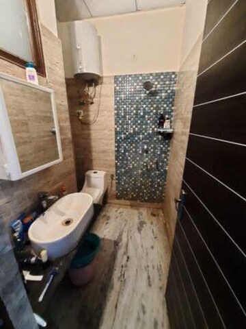 Bathroom in 4 BHK Apartment at Sunworld Vanalika, Sector 107 – for Sale