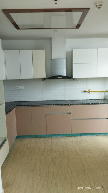 Kitchen in 3 BHK Apartment at ABA Cleo County, Sector 121 – for Rent