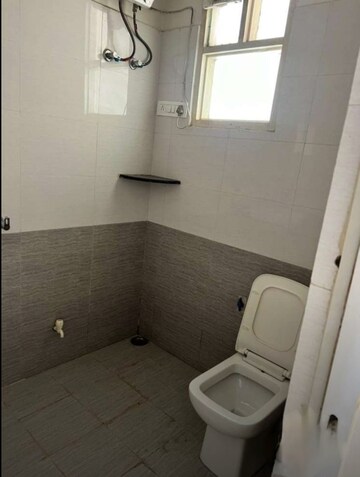 Bathroom in 1.5 BHK Apartment at Gomti Nagar – for Rent