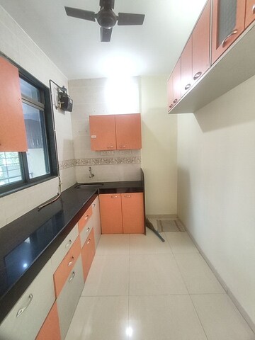 Kitchen in 2 BHK Apartment at  Sharada Ganesh CHS, Nerul – for Sale