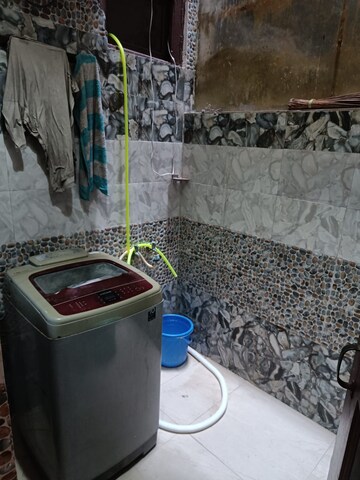 Bedroom in 3 BHK Builder Floor at Dhakoli Village – for Rent
