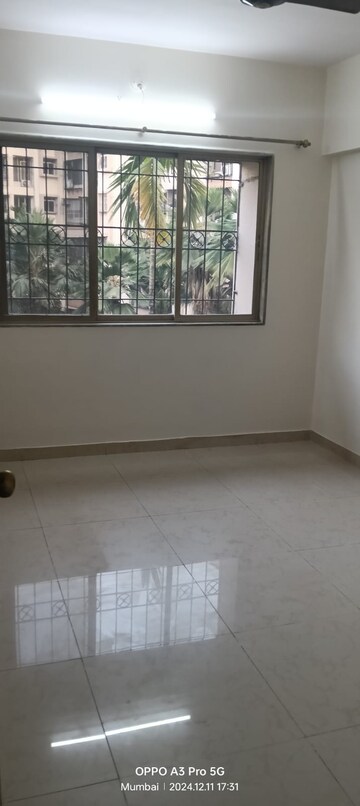 Living Room in 1 BHK Apartment at Malad Apartment, Malad West – for Rent