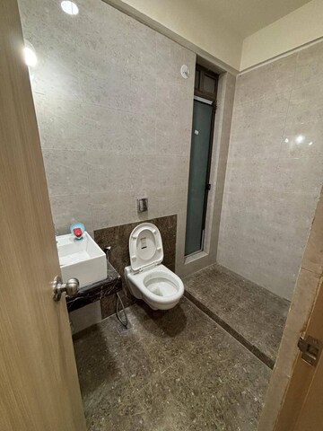 Bathroom in 2 BHK Apartment at Rajesh Raj Infinia, Malad West – for Rent
