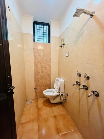 Bathroom in 3 BHK Builder Floor at Srishti Greenfield Homes, Green Fields Colony – for Sale