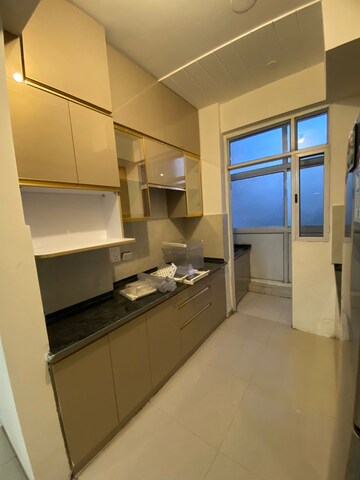 Kitchen in 3 BHK Apartment at Mahagun Moderne, Sector 78 – for Rent