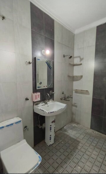 Bathroom in 4 BHK Builder Floor at Srishti Greenfield Homes, Green Fields Colony – for Sale