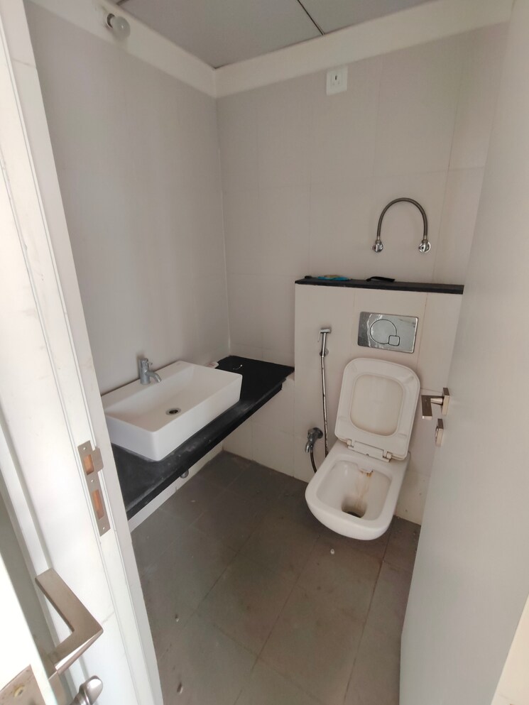 Bathroom, godrej-greens 2 Bedroom 563 Sq.Ft. Apartment In Undri Pune 8130023