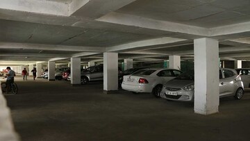 Parking in 3 BHK Apartment at Paradigm Business Hermitage Park, Dhakoli Village – for Sale