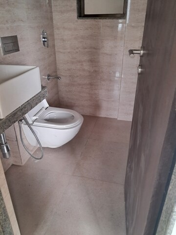 Bathroom in 1 BHK Apartment at Sunteck Maxxworld, Naigaon East – for Rent