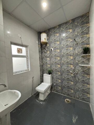 Bathroom in 1 RK Builder Floor at Ansal Sushant Lok I, Sector 43 – for Rent