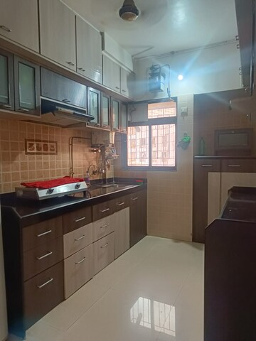Kitchen in 2 BHK Apartment at Hiranandani Estate Jasper, Ghodbunder Road – for Rent