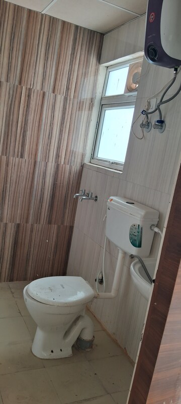 Bathroom in 2 BHK Apartment at Signature Global Proxima, Sector 89 – for Rent