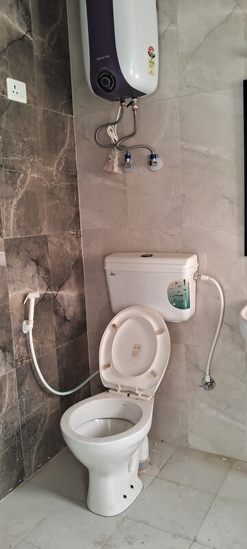 Bathroom in 2 BHK Apartment at Signature Global Proxima, Sector 89 – for Rent