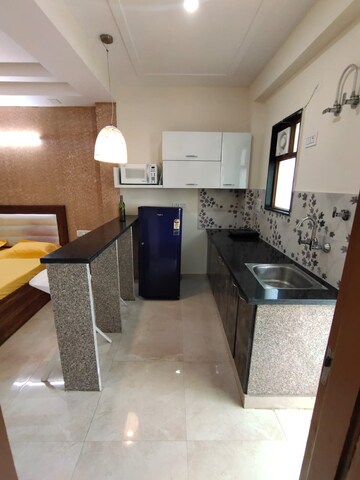 Kitchen in 1 RK Builder Floor at Ansal Sushant Lok I, Sector 43 – for Rent