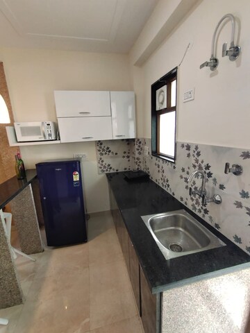 Kitchen in 1 RK Builder Floor at Ansal Sushant Lok I, Sector 43 – for Rent