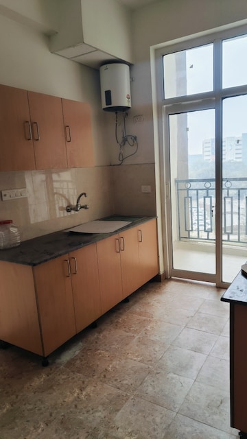 Kitchen in 3 BHK Apartment at Ansal API Celebrity Gardens, Sushant Golf City – for Rent
