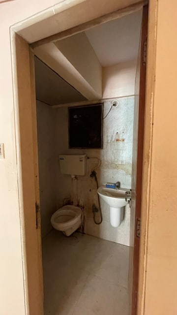 Bathroom in 2 BHK Apartment at Ravi Group Gaurav woods 2, Mira Road – for Rent