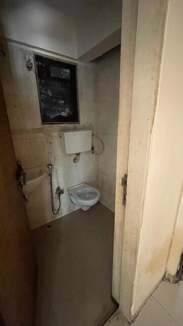 Bathroom in 2 BHK Apartment at Ravi Group Gaurav woods 2, Mira Road – for Rent