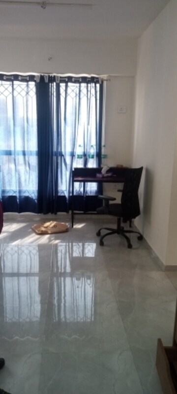 Living Room in 1.5 BHK Apartment at Earth Vintage, Dadar West – for Rent