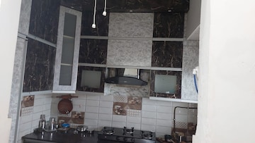 Kitchen in 2 BHK Apartment at Gaur City 2 - 12th Avenue, Sector 16c Greater Noida – for Rent