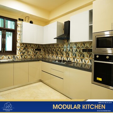 Kitchen in 4 BHK Apartment at Eros Edenwood Towers, Lakkarpur – for Sale