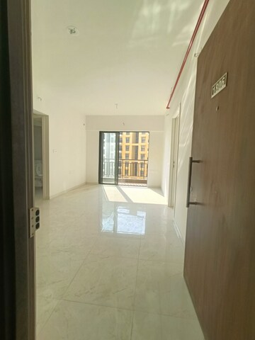 Living Room in 1 BHK Apartment at Runwal Gardens, Dombivli East – for Rent