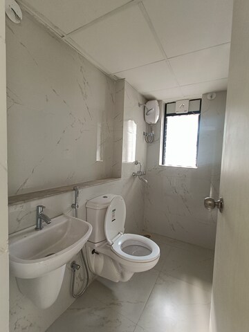 Bathroom in 1 BHK Apartment at Runwal Gardens, Dombivli East – for Rent