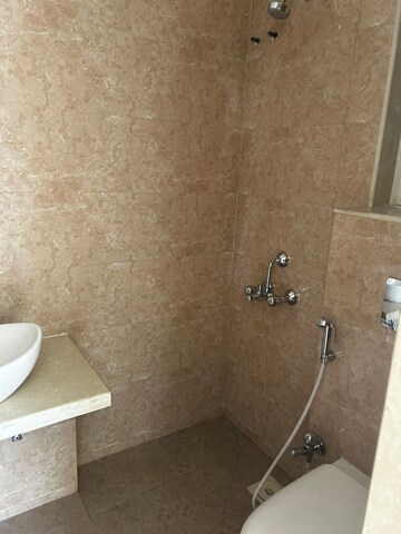 Bathroom in 1 BHK Apartment at JP Eminence, Andheri West – for Rent