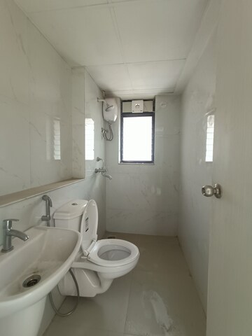 Bathroom in 1 BHK Apartment at Runwal Gardens, Dombivli East – for Rent