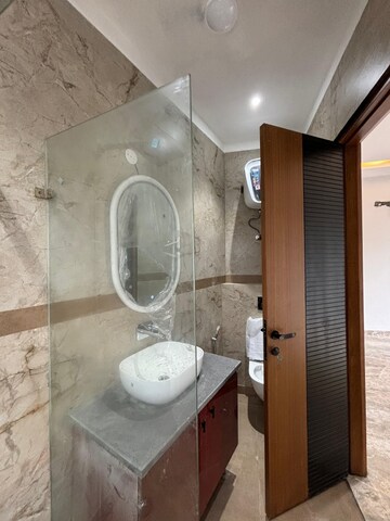Bathroom in 2 BHK Builder Floor at Mansarover Garden – for Rent