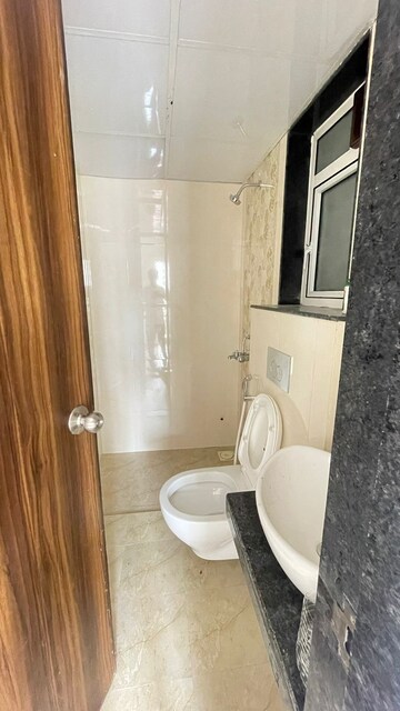 Bathroom in 1 BHK Apartment at JP North Alexa, Mira Road – for Rent